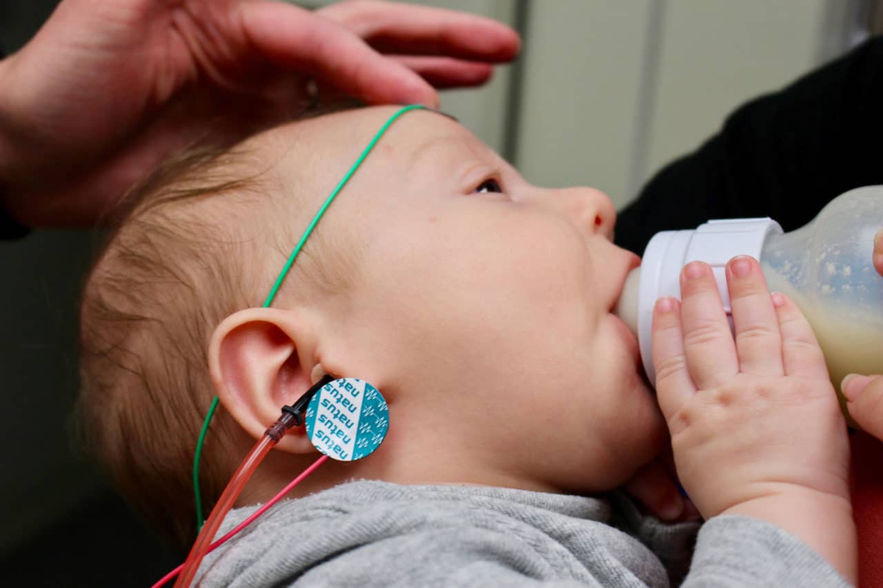 A baby getting a hearing test