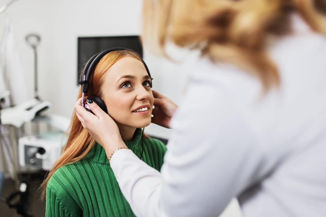 Woman getting a hearing test.