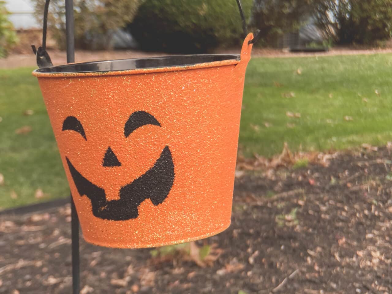 An orange Halloween pumpkin tin.